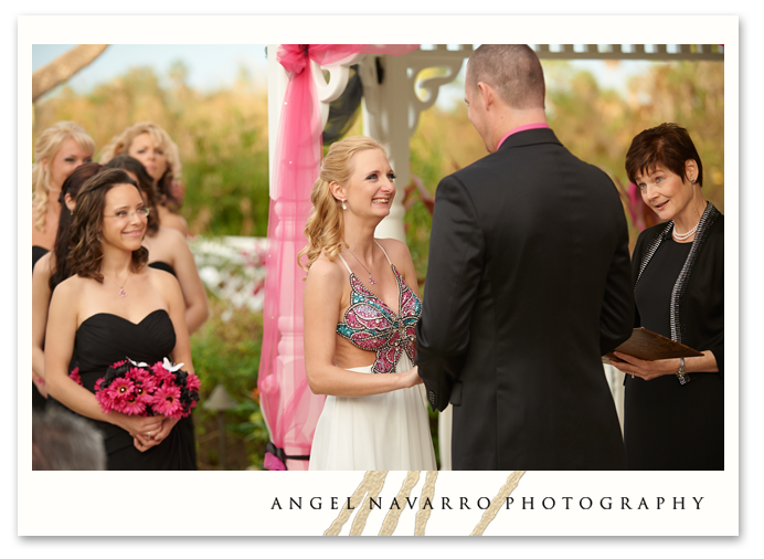 Very happy bride at the altar.