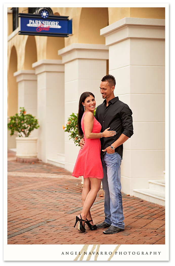 Cute sidewalk photo of a guy and girlfriend.