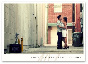 A back alley as a backdrop for this engaged couple.