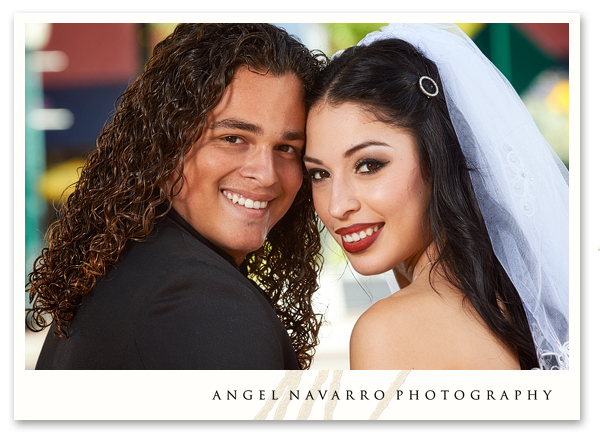 Fun Over the Shoulder Portrait of Wedding Couple