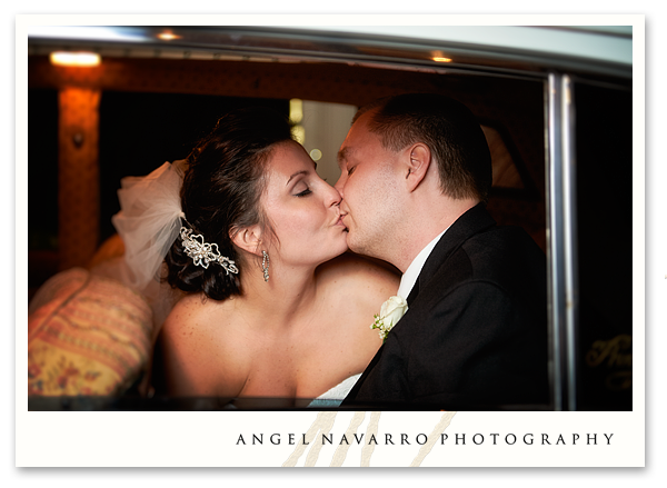 Bride and Groom Kissing in Limousine