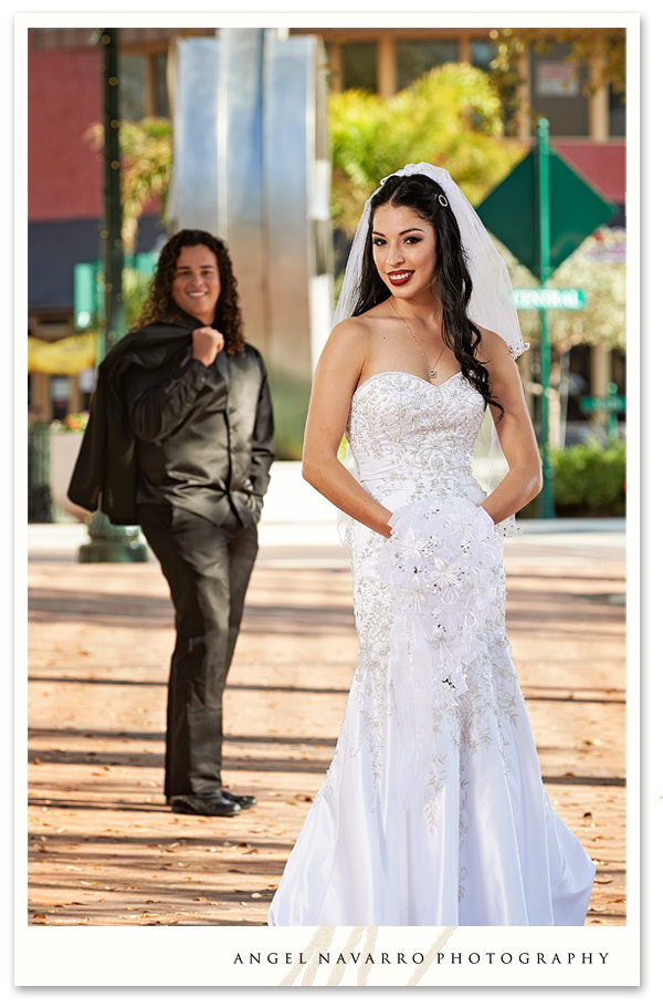 Bride photographed in front of groom in blur