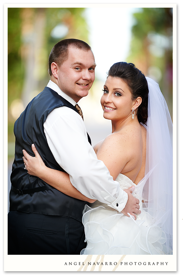 Bride and Groom Looking Ove their Shoulder