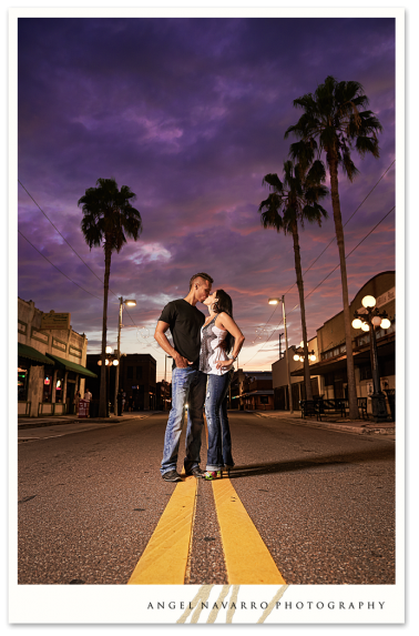 Amazing sky in this Ybor City photo of an engaged couple.