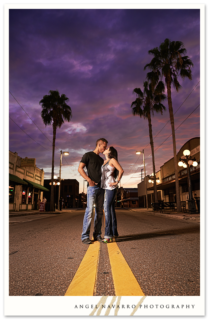 Amazing sky in this Ybor City photo of an engaged couple.