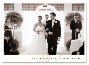 Bride and groom return from the altar.