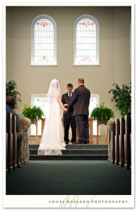 Bride and groom at the altar