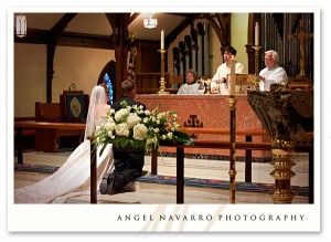 bride-groom-kneeling-altar-ceremony-tampa-photographer
