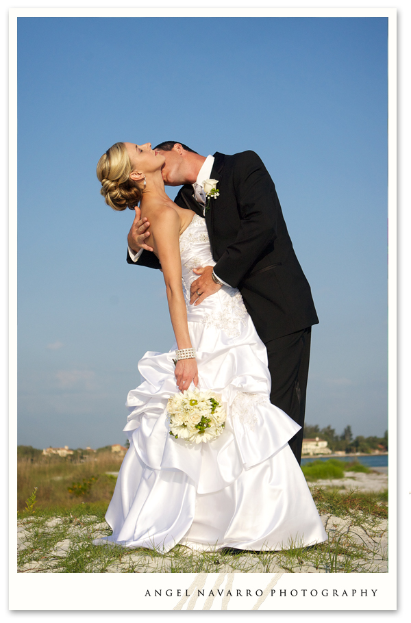 A romantic kiss on a sand dune