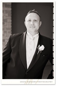 Photo of groom outdoors before the wedding ceremony.