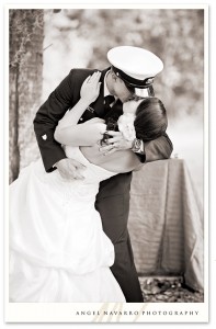 Military wedding soldier kissing bride