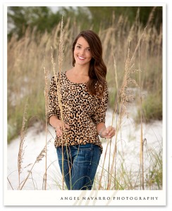 High School Senior Photographed by Sea Oats at the Beach