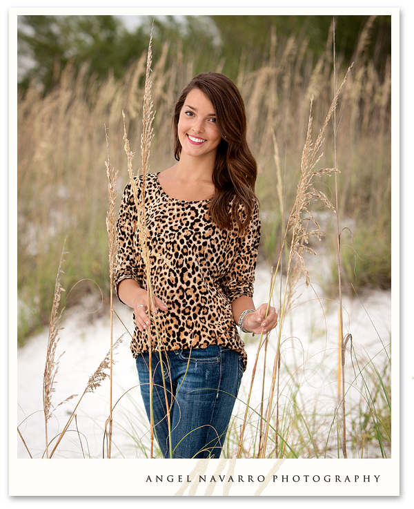 High School Senior Photographed by Sea Oats at the Beach