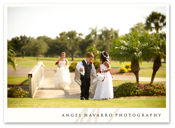 Ring bearer and flower girl Above The flower girl looks back to see the Ring bearer and flower girl Above The flower girl looks back to see the