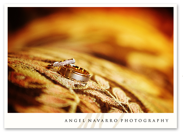 A creative photo of the wedding bands at the reception of Ernie and Sasha